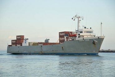 Tamp Bay, Florida, USA - February 22, 2011:The Cargo Ship 'Tropic Jade' underway in Tampa Bay. The ship is a roll on/roll off container ship (Ro/Ro) and is transporting conainers for Tropical Shipping